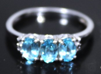 STERLING SILVER LADIES RING SIZE 9 BLUE TOPAZ STONES