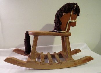 A Child's Wooden Rocking Horse