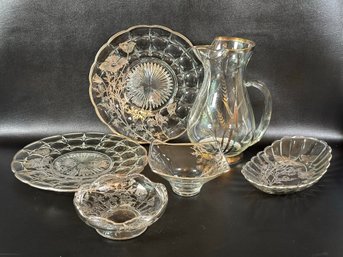 A Large Assortment Of Vintage Glassware With Silver & Gold Overlay