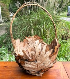 Basket Adorned With Dried Leaves