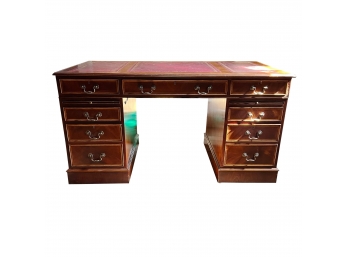 A Beautiful Classical Wood Desk With Inlay Detailing And Leather Top