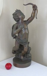 Cast Resin Statue Of Cupid Having Just Let Loose His Arrow.....