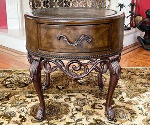 A Leather Clad Side Table With Nailhead Trim