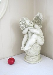 Sleeping Angel Sitting Legs Astride A Large Floor Vase Sculpture, Head Resting On The Rim.