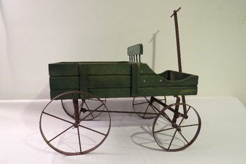 A Green Decorative Wooden Wagon