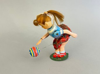 T.P.S. Tin Litho Wind Up Suzy Bouncing Ball