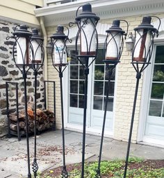 A Set Of 6 Iron Garden Torches