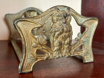 An Antique Art Nouveau Brass Bookend