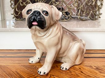 A Large Ceramic Pug Statue