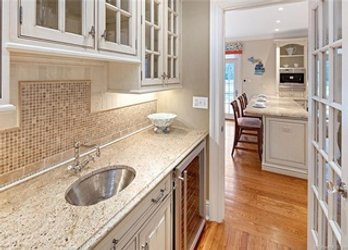 A Custom Birchcraft Solid Wood Butlers Pantry - Granite Top - Glass Panes - Rohl Bar Faucet