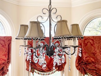 A Metal And Beaded Chandelier