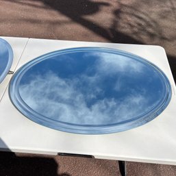 An Oval Custom Made Beveled Mirror