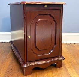 A Side Table With File Storage And Pull Out Writing Desk