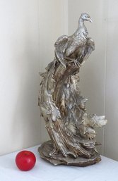 A Silvered Peacock Sculpture