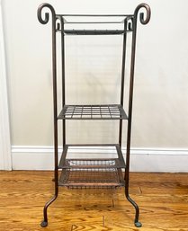 A Tiered Metal Plant Stand