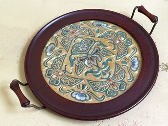 A Wood Tray With Embroidered Silk Inset Panel