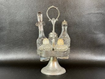 A Victorian Castor Set With Metal Stand & Original Cruets