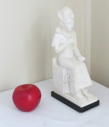 A Seated Sculpture Of An Egyptian Priest