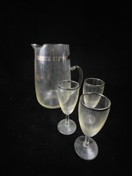 Silver Trimmed Pitcher And Glass Set