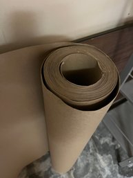 A 36' Roll Of Heavy Cardboard Floor Protection Paper