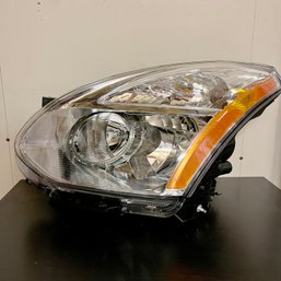 A Nissan Headlight - NIB