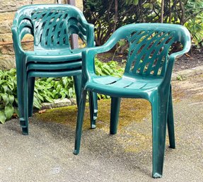 A Set Of 4 Moulded Plastic Outdoor Chairs