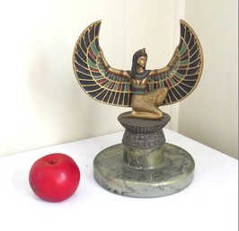 A Winged Egyptian Goddess Isis On A Marbled Glass Base