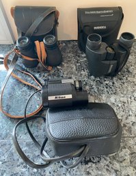 Three Pairs Of Binoculars