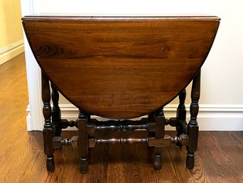 An Antique Mahogany Gate Leg Drop Leaf Table