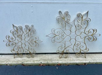 Pair Of Gilt Decorated Metal Snow Flake Wall Hangings