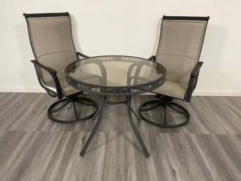 Pair Of Outdoor Swivel Rocking Chairs With Table