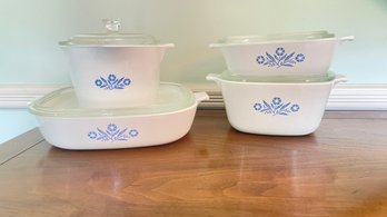 A Set Of Four Corning Ware With Lids Made In USA