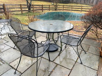 WROUGHT IRON OUTDOOR CHAIRS AND TABLE WITH UMBRELLA STAND