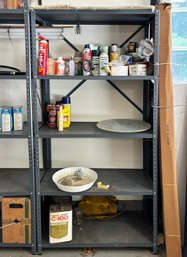 A Metal Garage Shelf And Contents