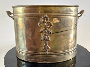 A Large Brass Wastebasket