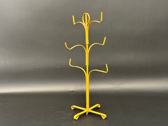 A Vintage Mug Tree In Yellow Metal