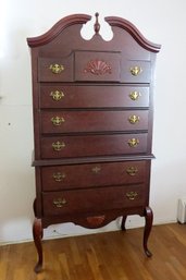 A Queen Anne High Boy Dresser In Cherry Finish