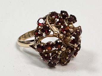 A Ring Of Garnet In 18K Gold Setting Size 6