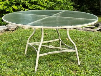 A Vintage Cast Aluminum And Tempered Glass Dining Table By Brown Jordan