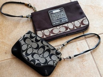A Pair Of Wallets By Coach