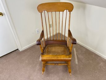 Early American Spindle Back And Cane Seat Rocking Chair