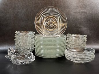 A Large Assortment Of Vintage Glass Plates & Bowls