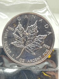 1989, Canadian Maple Leaf $5 Pure Silver 1 Oz Uncirculated Coin.