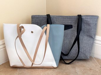 A Pairing Of Large Ladies' Bags