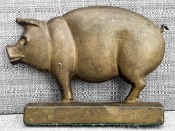 A Large Antique Brass Pig Doorstop