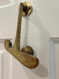 A Brass Golf Door Knocker