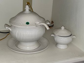 A CONTEMPORARY WHITE IRONSTONE TUREEN, LADLE, AND SAUCE