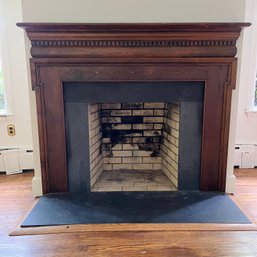 A Wood Fire Place Mantle And Surround - Primary