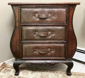 A Leather Clad Nightstand Or Petit Dresser