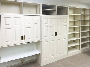 A Wall Of Built In Cabinets (Basement)